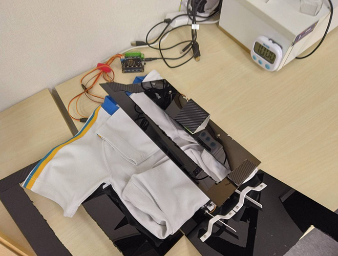 全自動服たたみ機